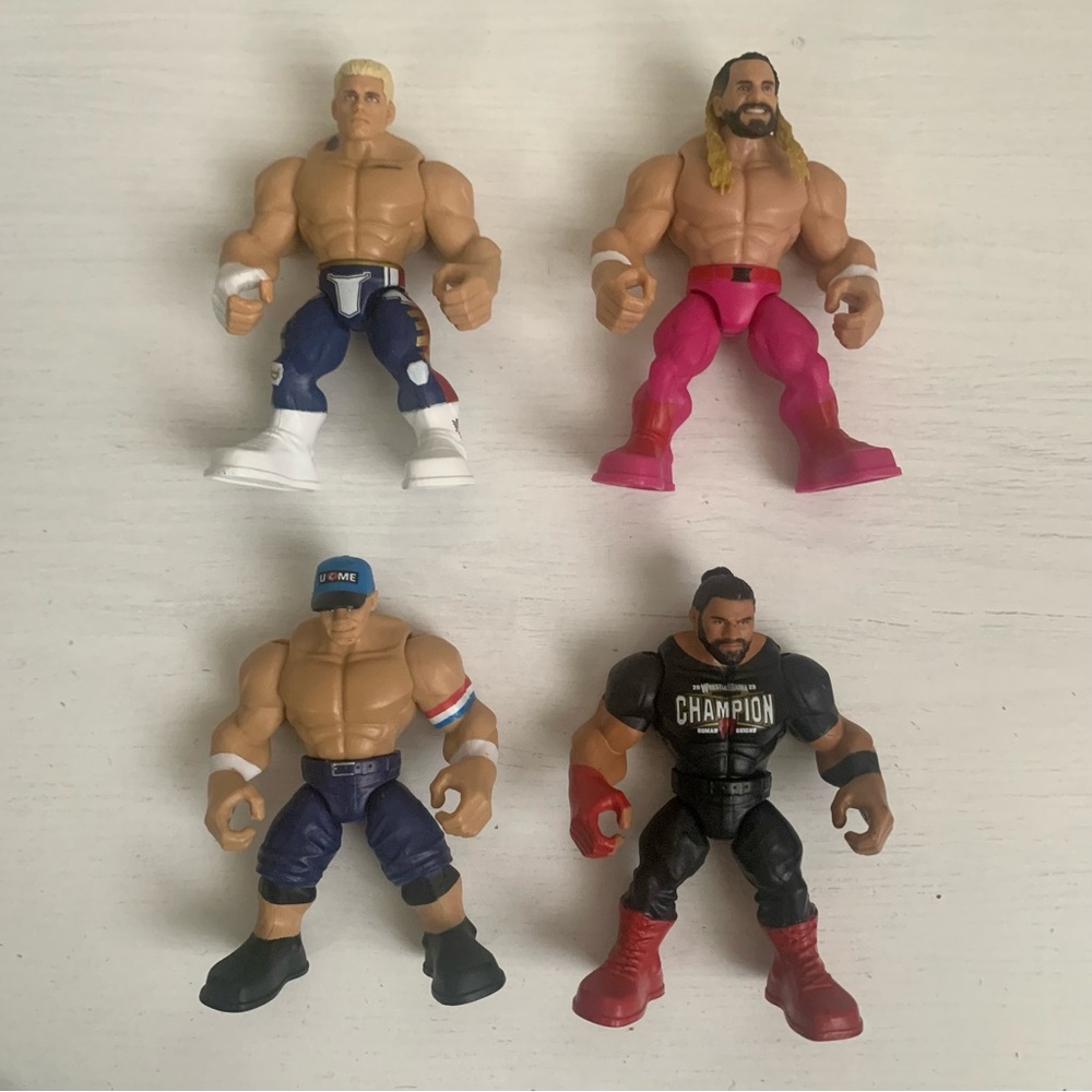 WWE Knuckle Crunchers Lot of 4 Figures Rhodes Cena Reigns Rollins Mattel 2023